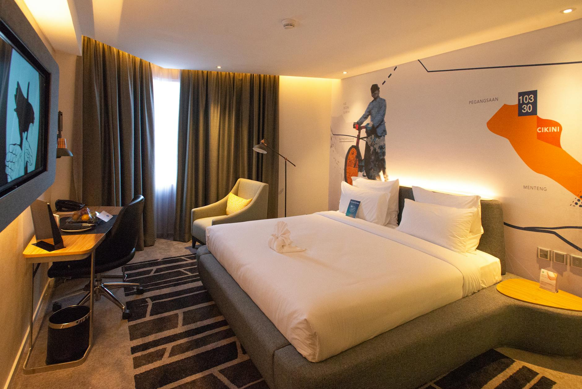 Comfortable hotel room interior in Brussels with modern furnishings and natural light