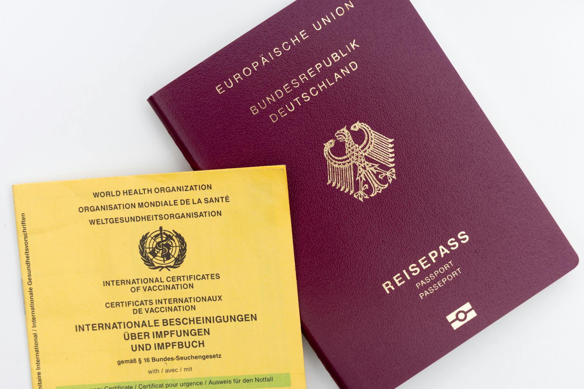 Passport and travel documents laid out on a table ready for international travel
